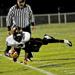 Elmwood Park's Marcellus Hunter dives for a first down after catching a pass.