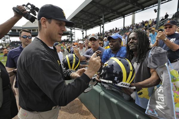 Harbaugh blasts NCAA satellite camps decision