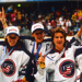 The 1998 U.S. Olympic Women's Ice Hockey Team celebrates gold in Nagano.