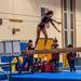 Image of a Minneapolis Roosevelt High School gymnast performing on the balance beam.