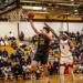 Mpls Roosevelt Basketball player Calvin Peterson soars to the rim for a layup