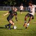 Minneapolis Roosevelt Boys Soccer player stops the ball during a soccer match at Al Gowans Stadium