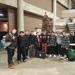 The White Hawks wrestlers pose by the Christmas tree at the Mat Boss Christmas tourney.