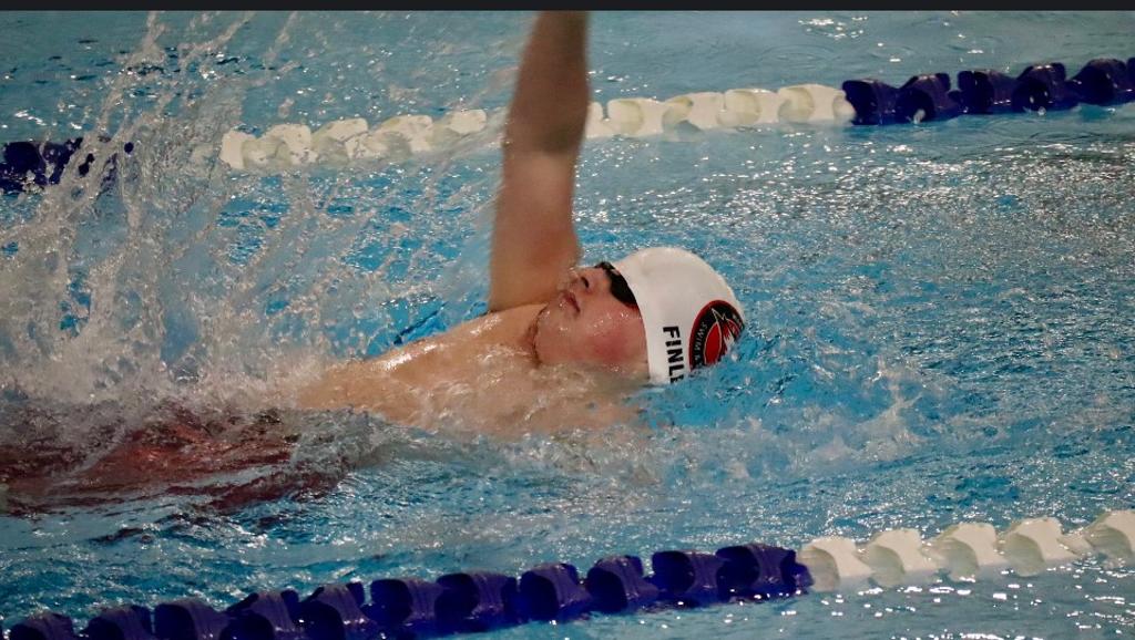 Tyler Finley swims the 100 backstroke
