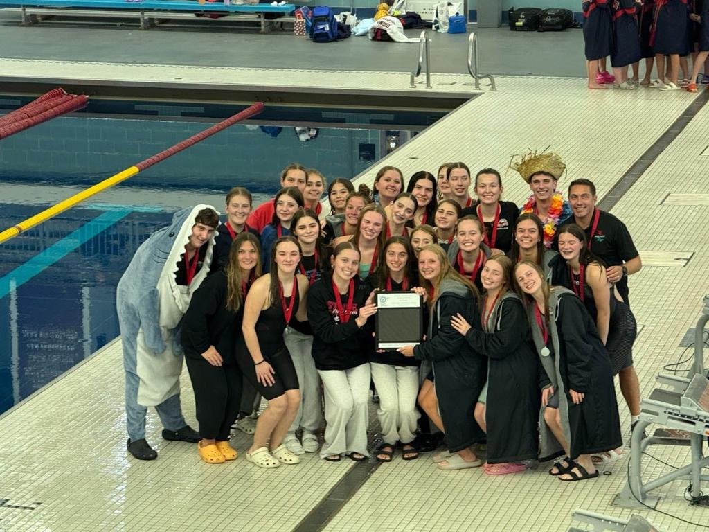 swim team on pool deck