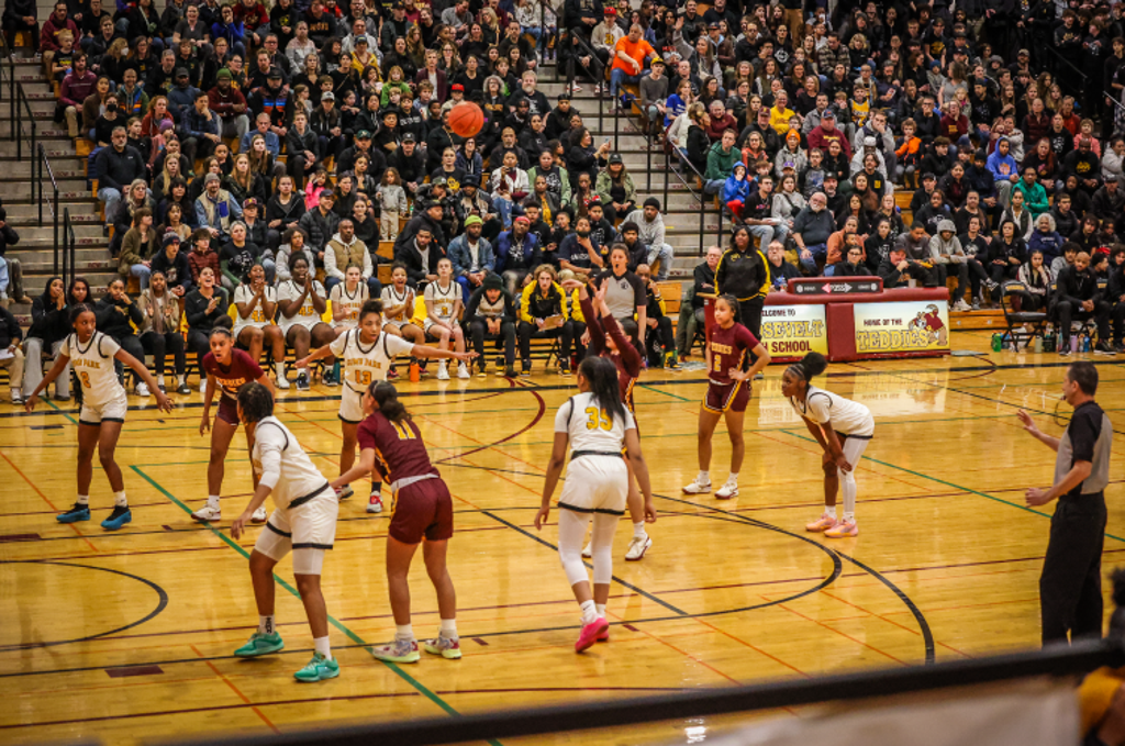 Image of Minneapolis Roosevelt Teddy Girls Basketball game in a packed Jack Wells Gymnasium 