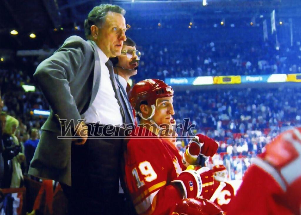 Minneapolis Roosevelt High School Hockey Coach Bob Johnson coaching during a game with the Calgary Flames