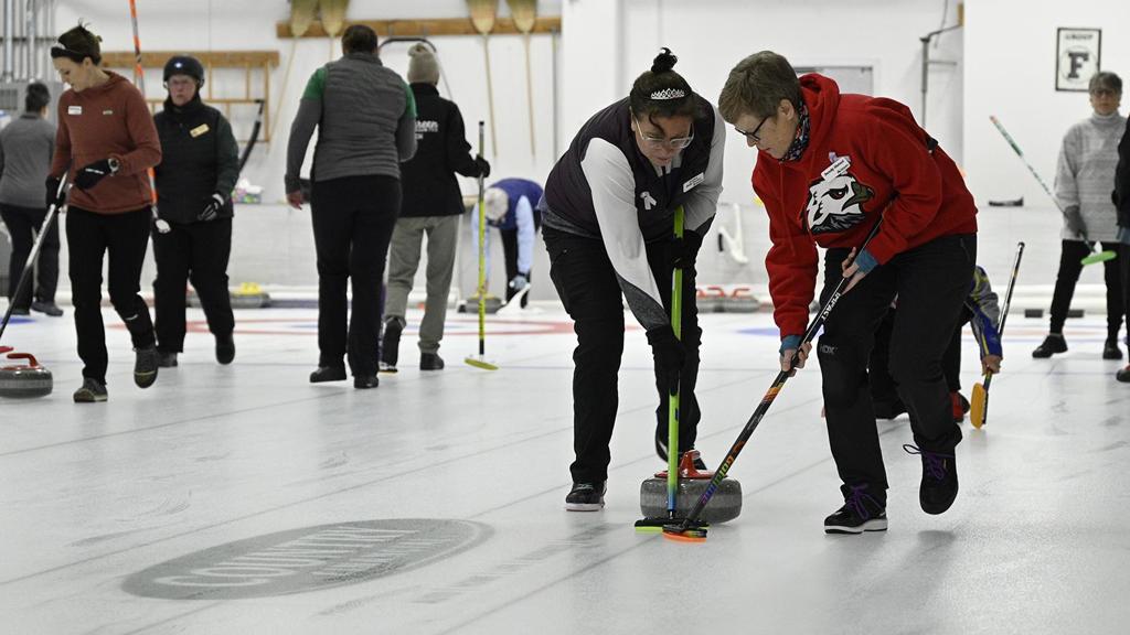 Participants of 2025 bonspiel in action