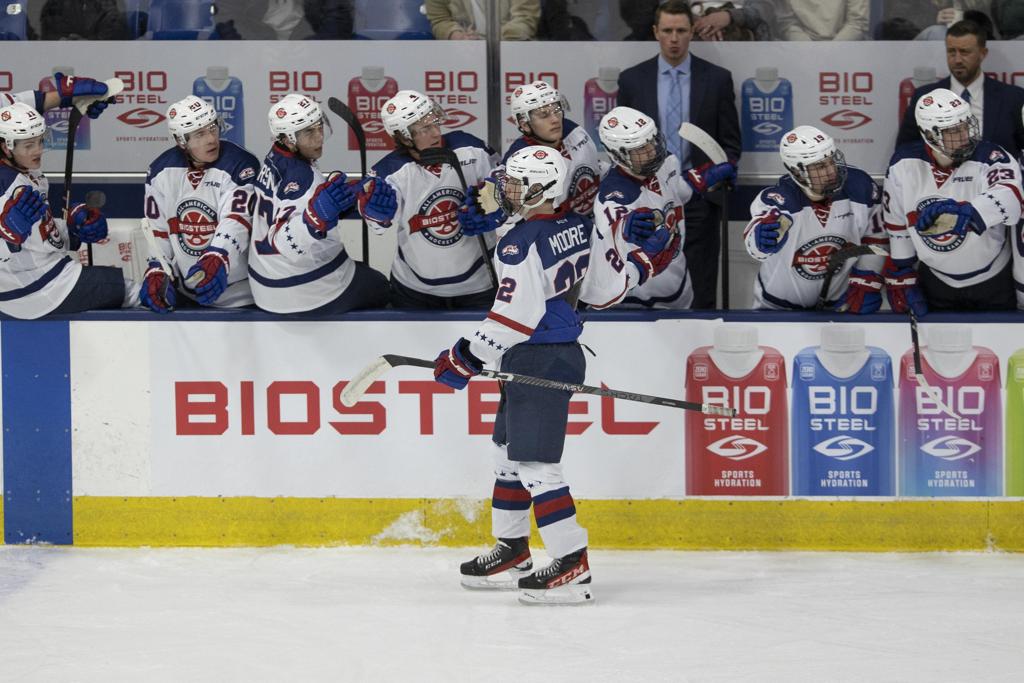 Nick Oliver leads Team White behind the bench at the 2023 BioSteel All-American Game.