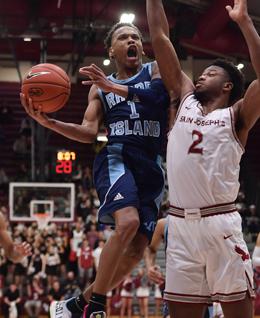 Russell's return home sparks Rhode Island past St. Joe's